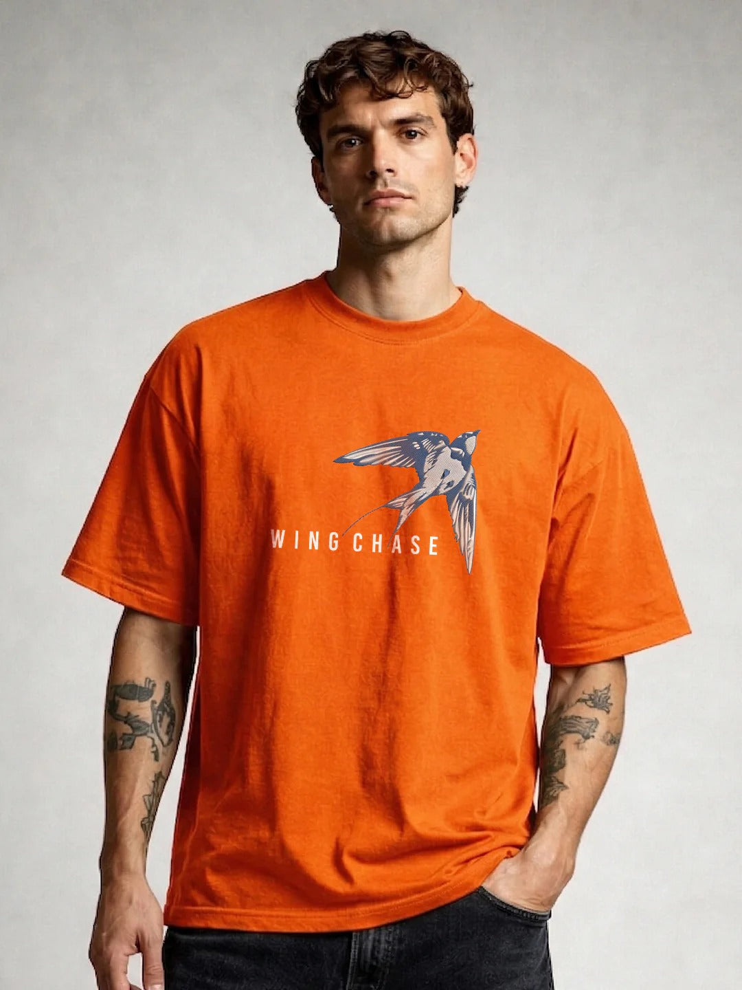 Pronks Men's Orange Wing Chase Oversized Cotton Graphic T-Shirt | Premium Casual Bird Print Half Sleeve Round Neck Streetwear Tee